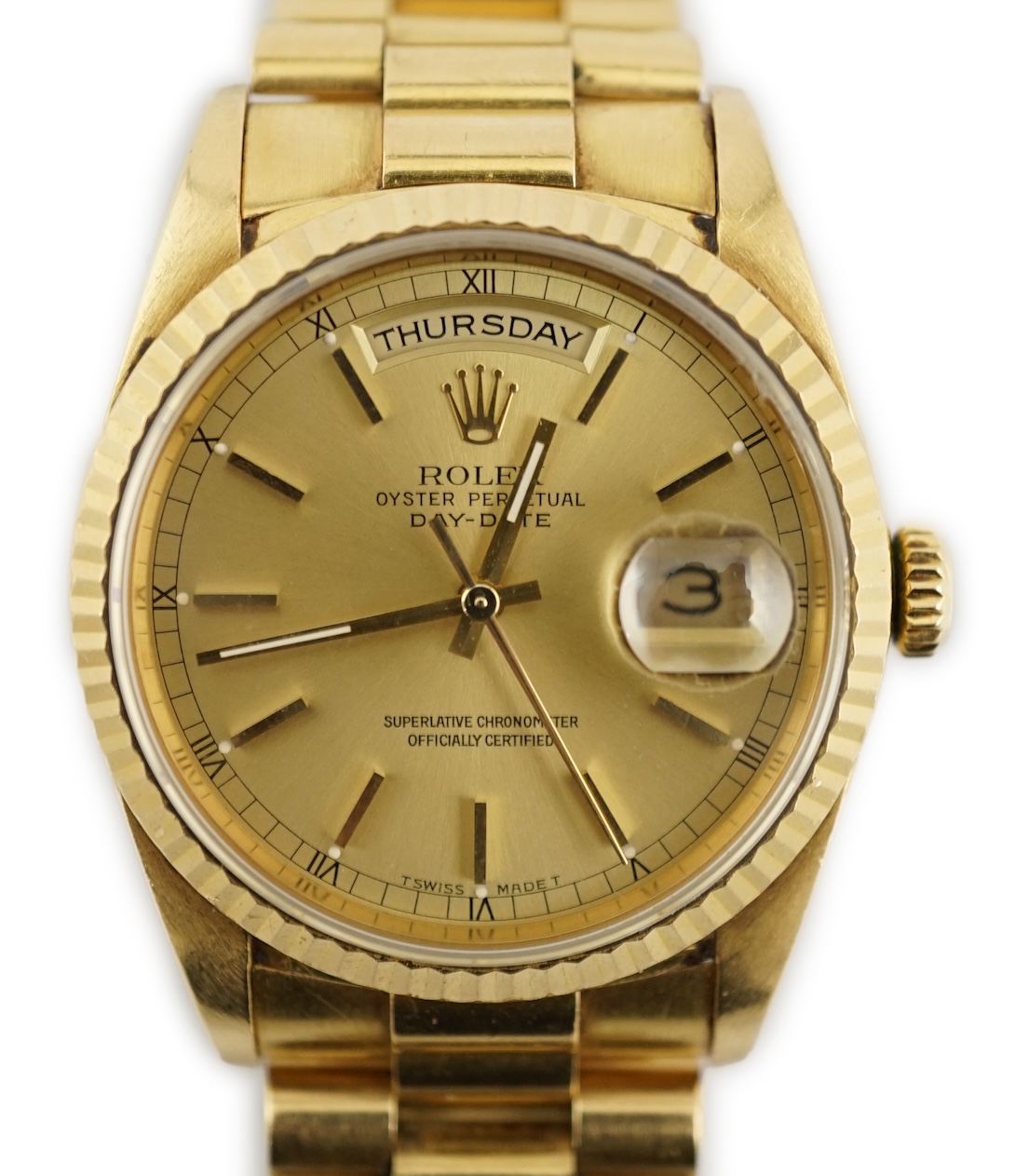A gentleman's late 1980's 18ct gold Rolex Oyster Perpetual Day/Date wrist watch, on an 18ct gold Rolex bracelet with deployment clasp